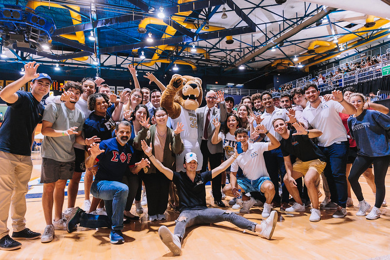 Alumni and students at a basketball game
