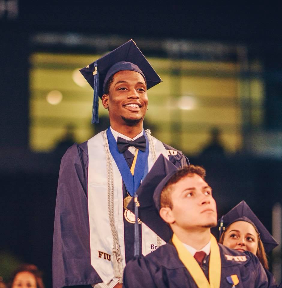Price Destinobles '18 stands to be recognized as a Worlds Ahead Graduate at his December 2018 commencement